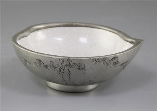 A Chinese Yixing pottery and pewter mounted peach shaped cup, late 19th century, length 13cm